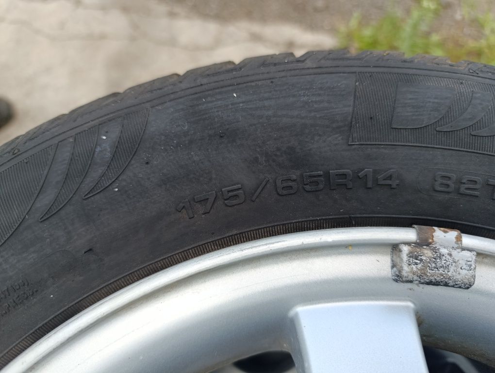 Диски л.п R14 с резиной 4*100 на Опель