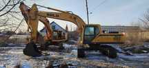 Экскаватор гусеничный с гидромолотом аренда, заказ, услуги