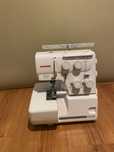 Оверлок Janome HQ-090D белый