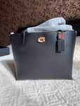Продам оригинальную сумку фирмы "Coach"