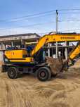 Услуги экскаватора колесный HUNDAI 145 гидромолотом