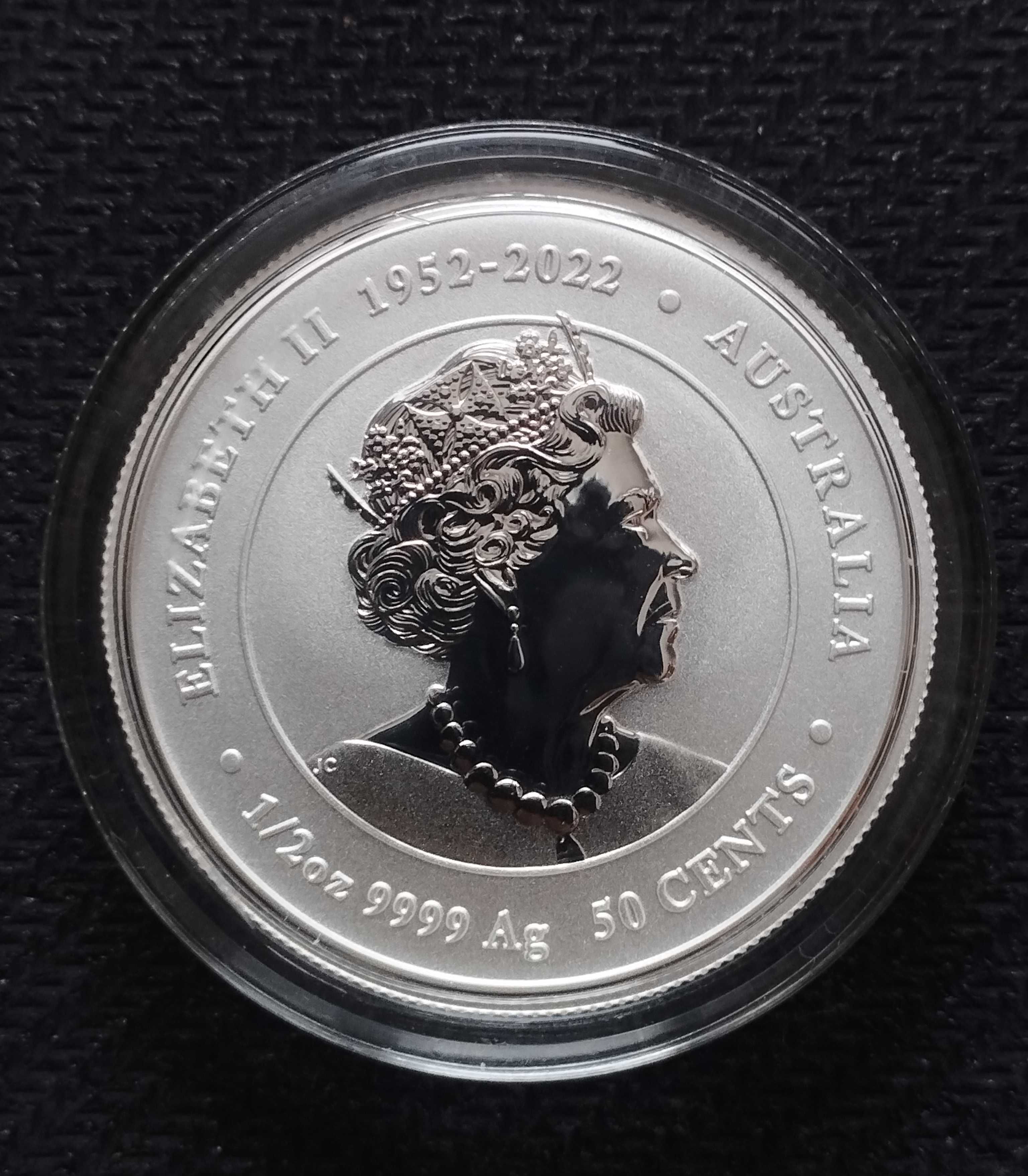 Серебряные монеты 1893 и 2022 гг.