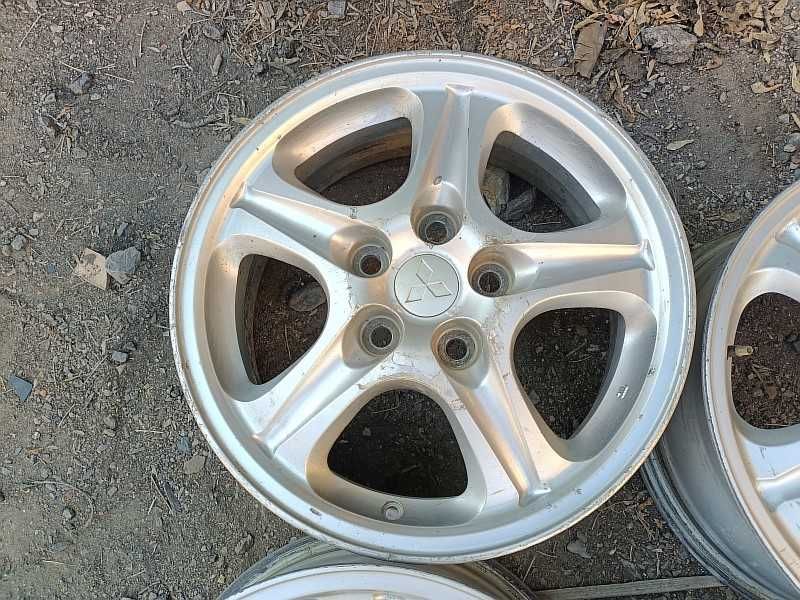 Продам оригинальные легкосплавные диски на автомашину Mitsubishi