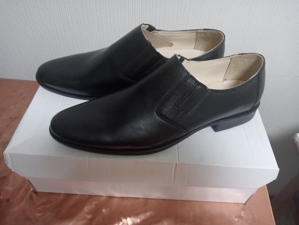 Продам мужские туфли,кожанный