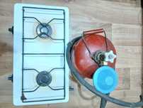 Продам настольную газовую плиту б/у  и баллон 5л.