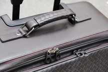 Кожаный чемоданчик Bottega Veneta
Intrecciato