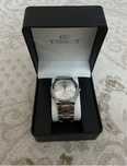Часы Tissot.