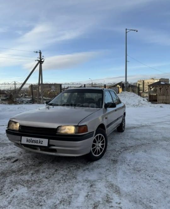 Продам машину Mazda 323