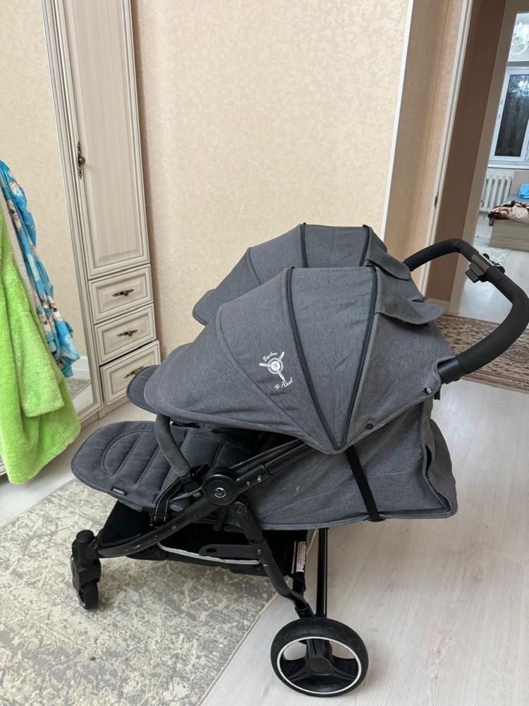 Коляска для двойни