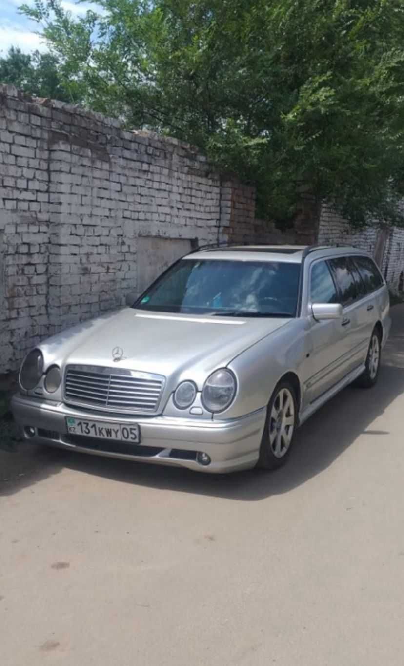 Бампера на Mercedes-Benz W210 универсал и спойлер Lorinser
