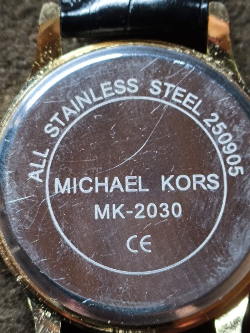 Продам часы Kors