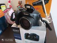 Фото оператор sony DSC-H100