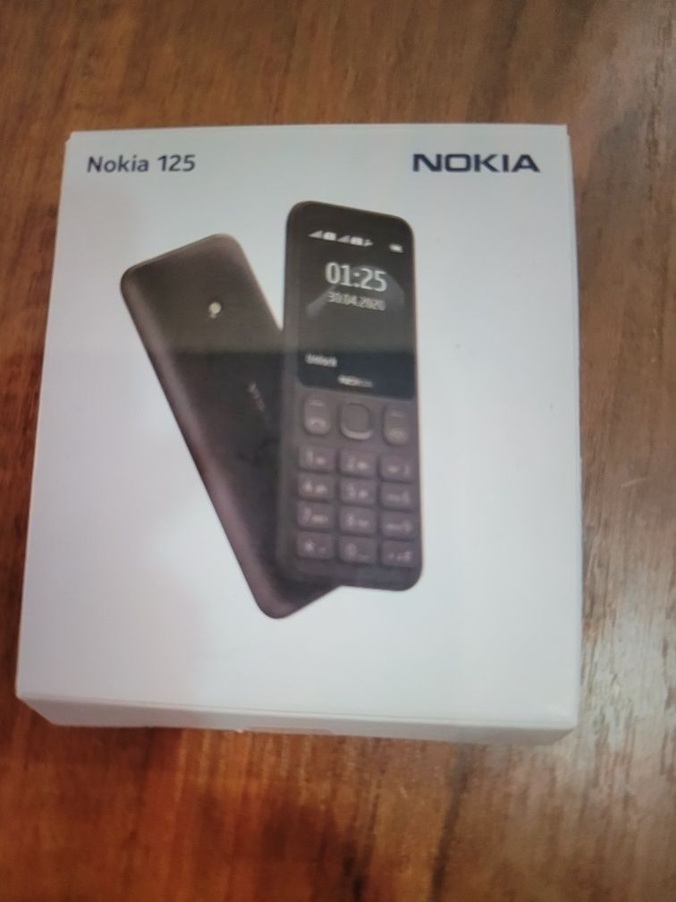 Сотовый телефон Hokia125