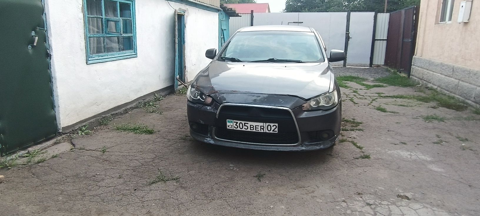 Митсубиси Лансер Х