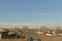 Продам участок вдоль трассасы с времянкой 10 соток