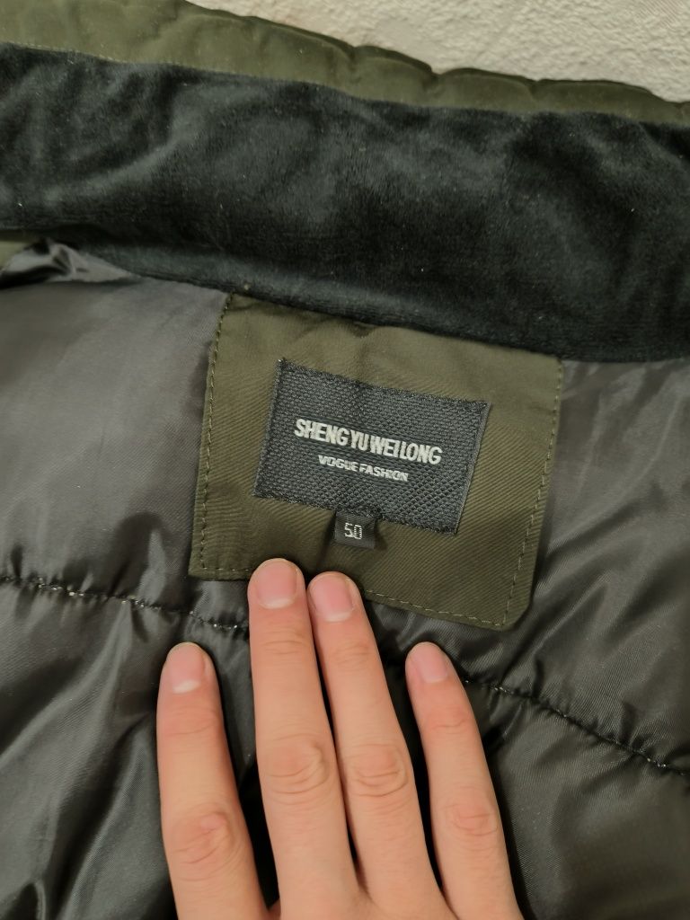 Продам тёплую зимную куртку tnf 50 размер
