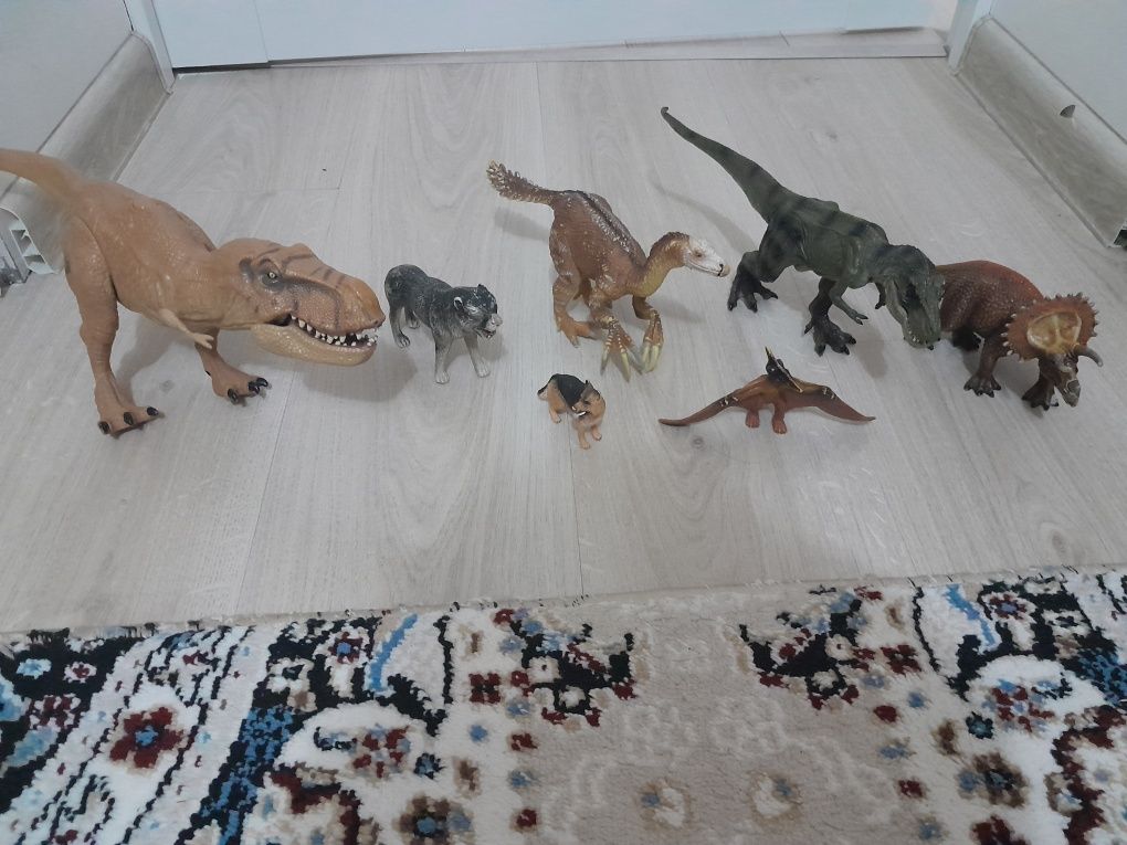 Игрушки модельки динозавры