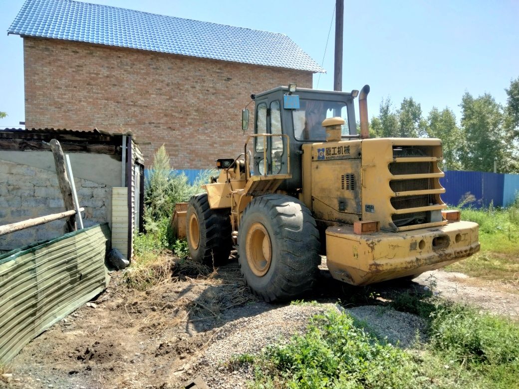 Погрузчик 3х кубовый.