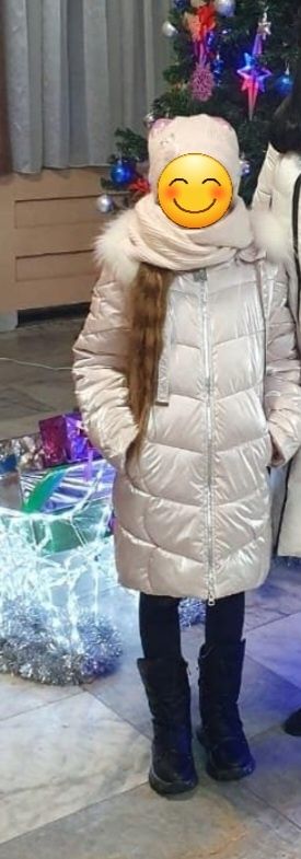 Продам Зимний пуховик.