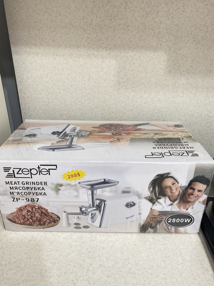 Продам электрическую мясорубку Zepter