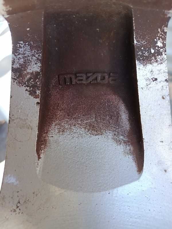 Продам оригинальные легкосплавные диски на автомашину Mazda.