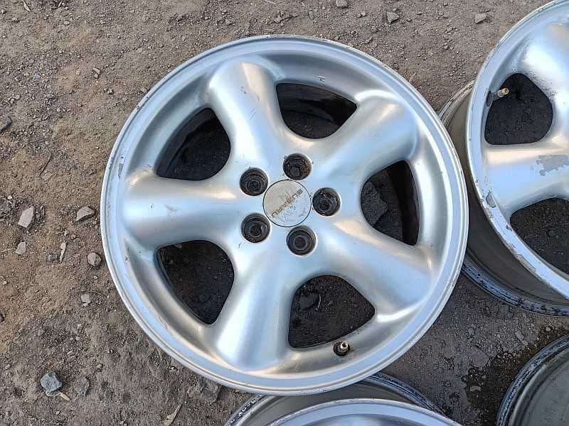Продам оригинальные легкосплавные диски на автомашину Subaru