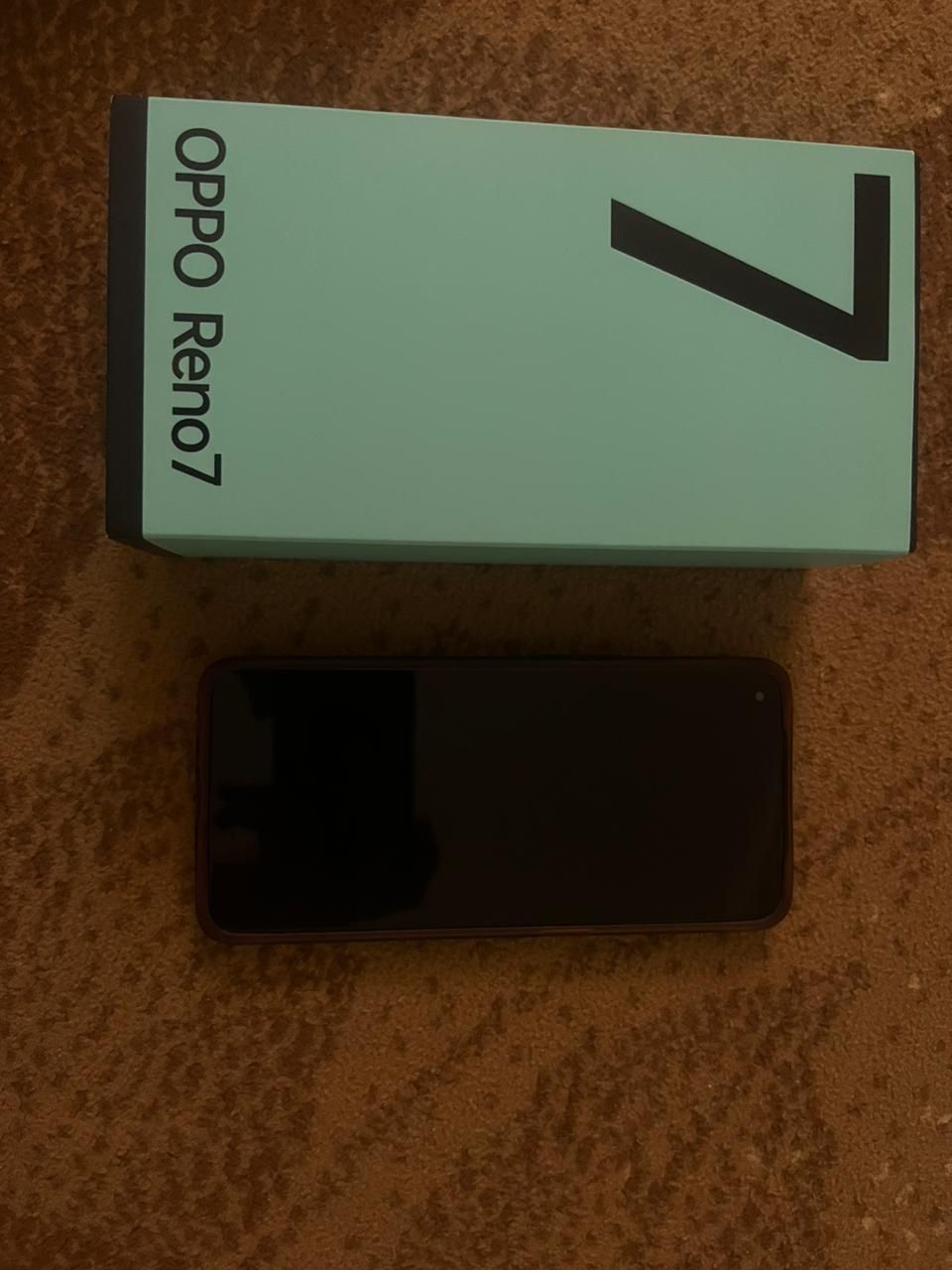 Телефон Oppo Reno 7