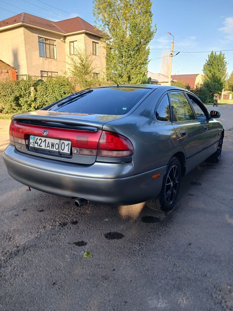 Мазда кронос в хорошем состояний