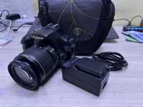 Canon EOS 1100D с объективом 18–55 мм