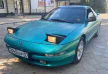 Продается автомобиль марки Ford Probe 1993 года бирюзового цвета