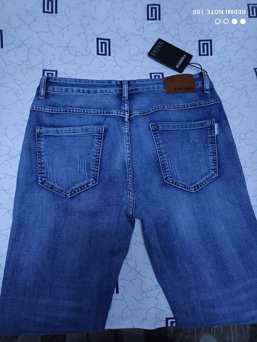 Продам новые джинсы 52