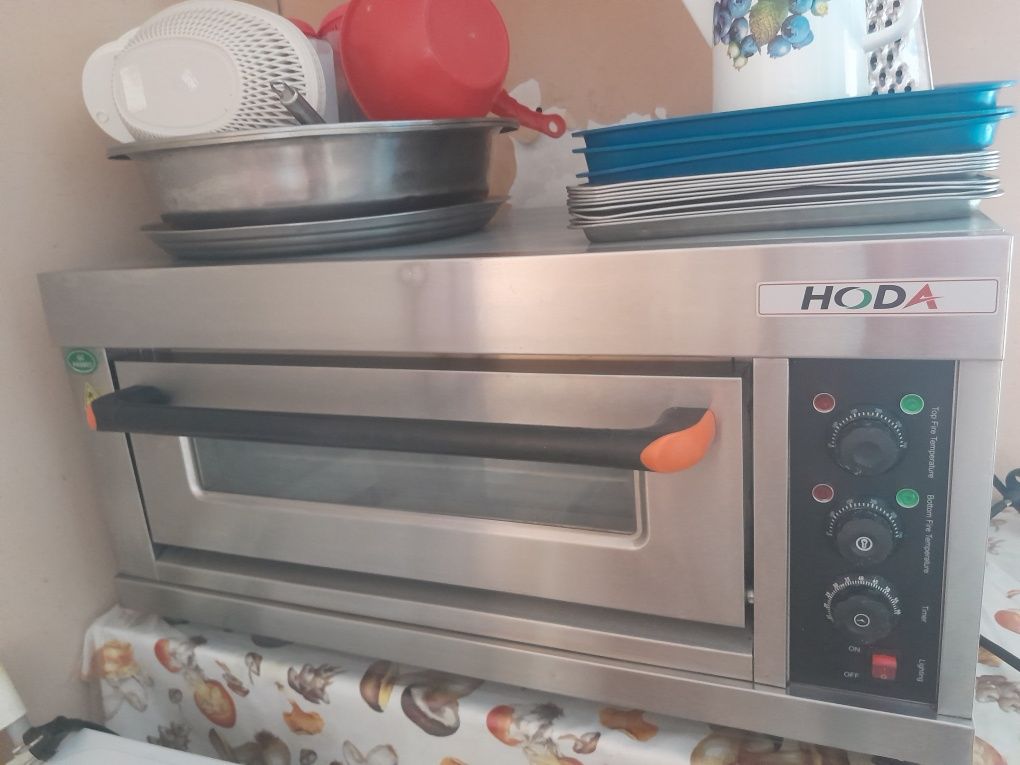 Продам духовку Hona