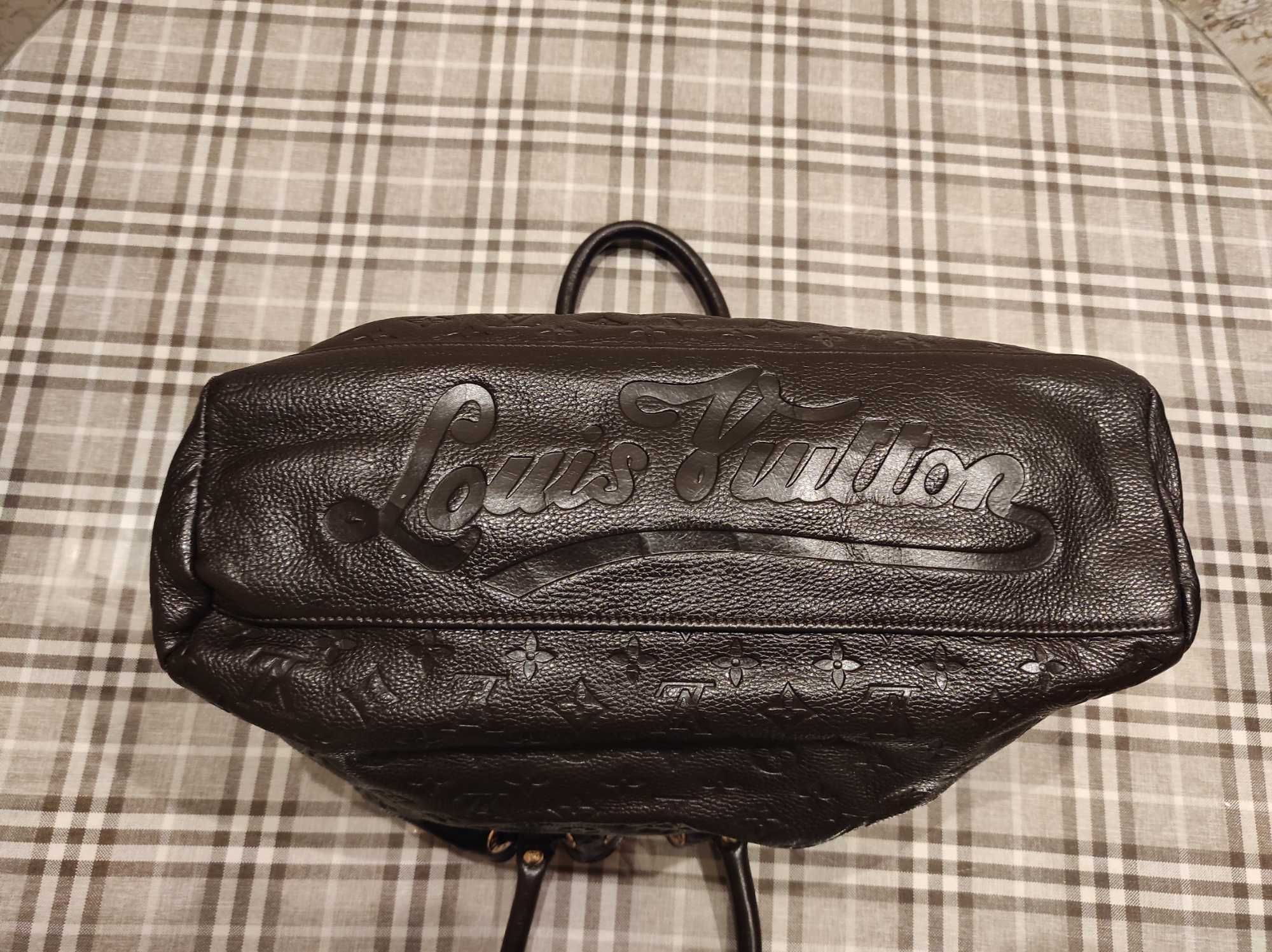 Сумочка то  Louis Vuitton