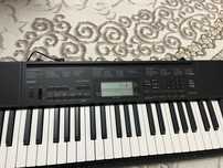 Синтезатор Casio.