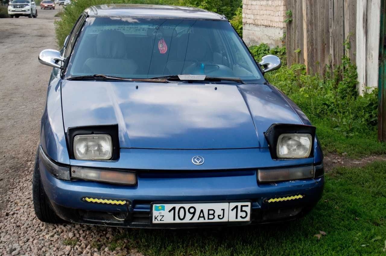 Mazda 323F BG обменяю более новое авто +500 -600тысяч моя доплата