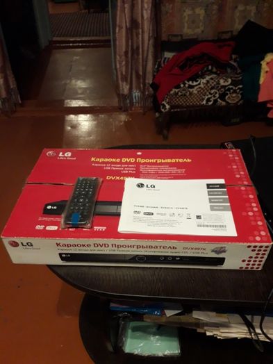 Продам новый DVD проигрыватель DVX 497K+3G USB модем Kcell ZTE.