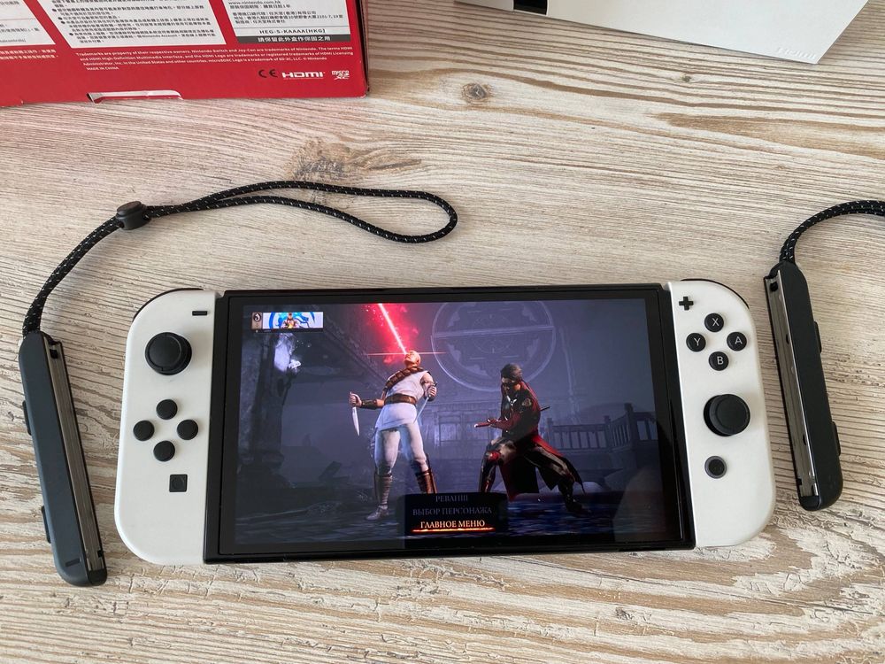 Nintendo Switch Oled белый + подарок картридж Mortal Kombat