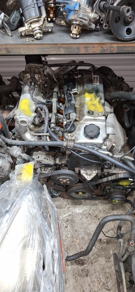 Двигатель и коробка Автомат Мицубиси Лансер объем 1.6 4G18