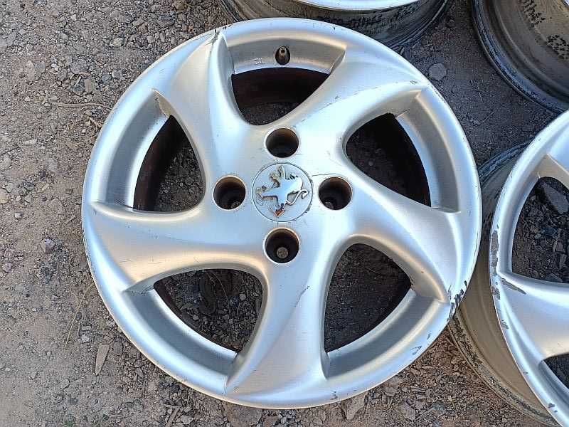 Продам оригинальные легкосплавные диски на Peugeot 206