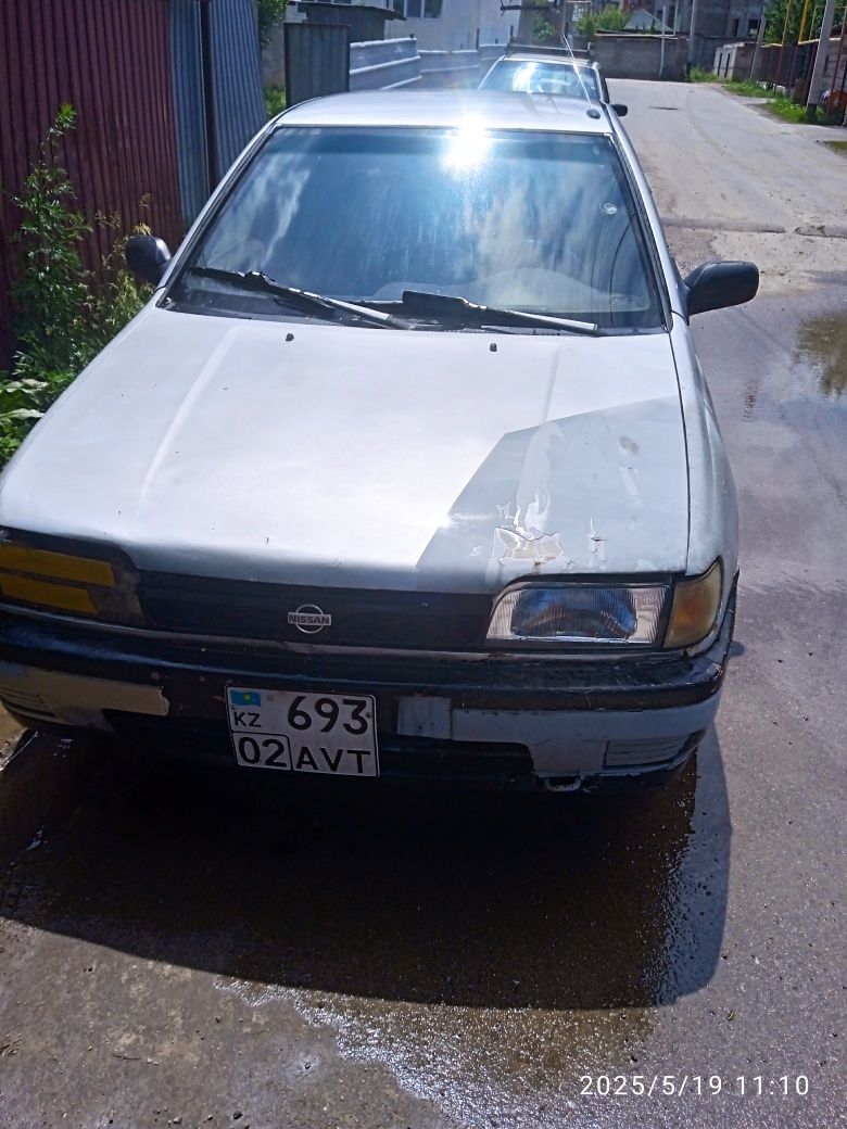 Ниссан сани. 1.6