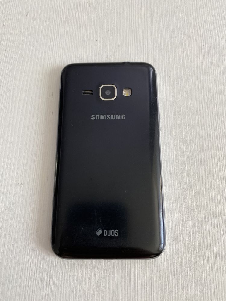 (Нерабочий) Samsung galaxy J1 продам на запчасти