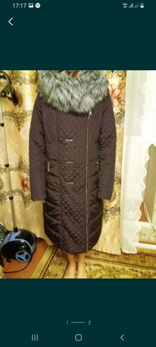 Продам пуховик .
