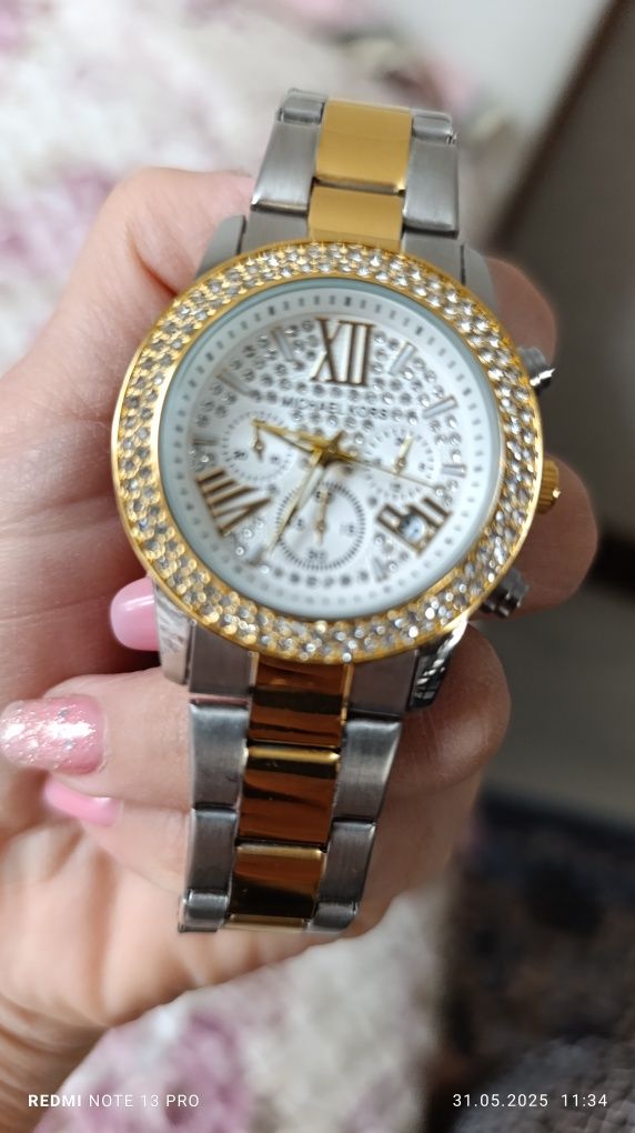 Продам женские часы Michael Kars