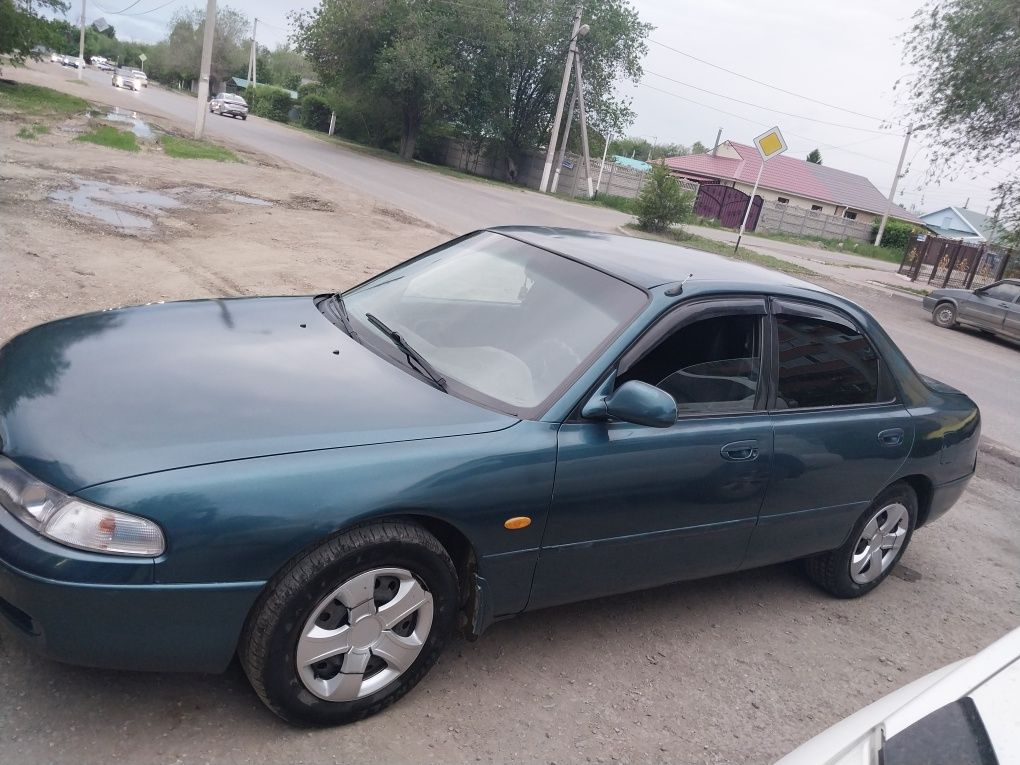 Продам машину мазда кронос 1992 года выпуска, в  отличном состоянии