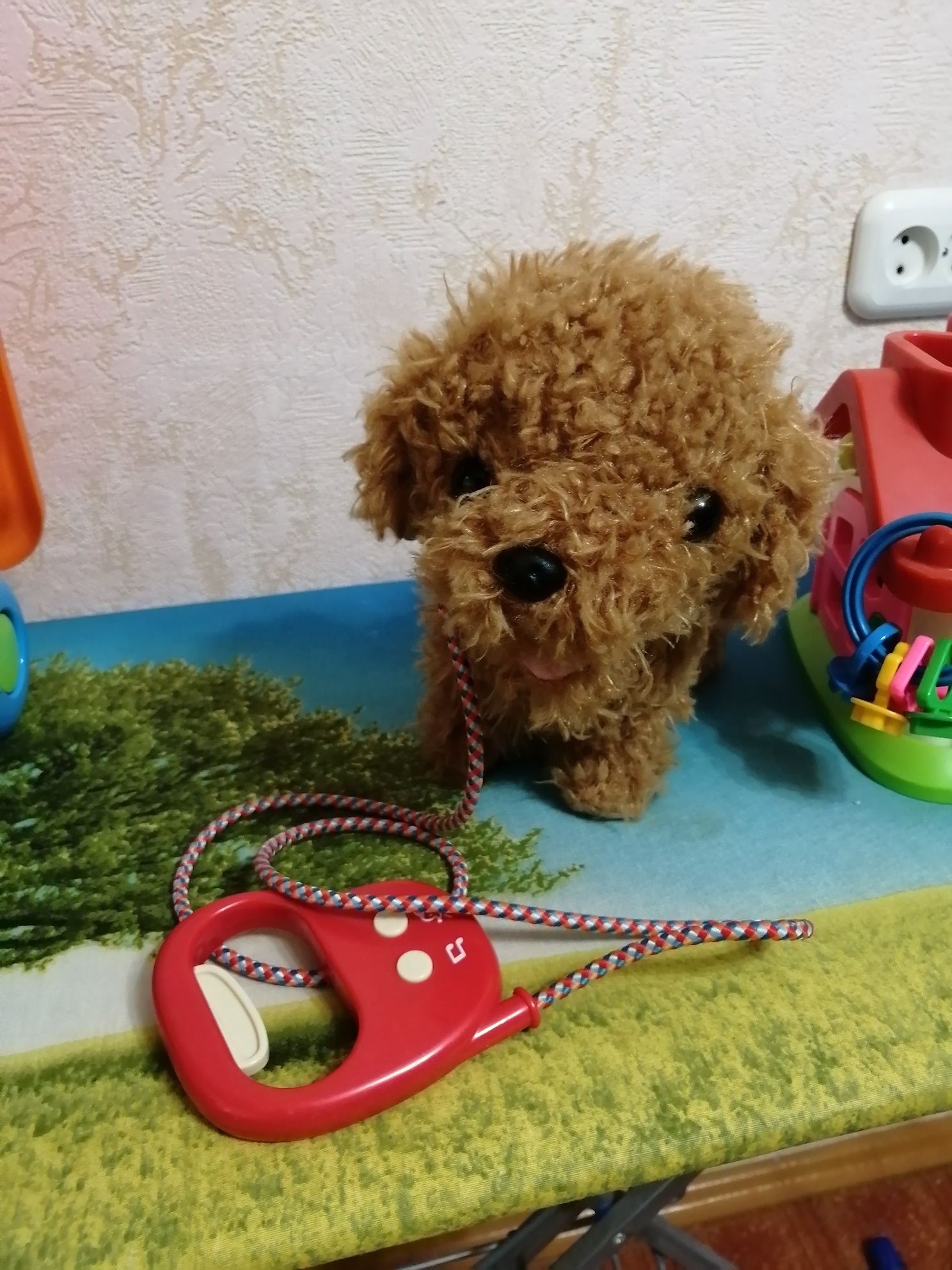 Игрушечная собачка