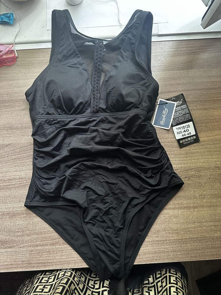 Продам купальник новый