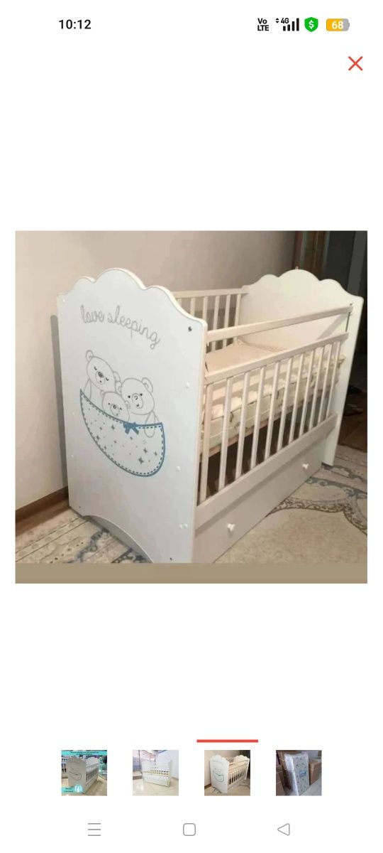 Детская кроватка с качалкой