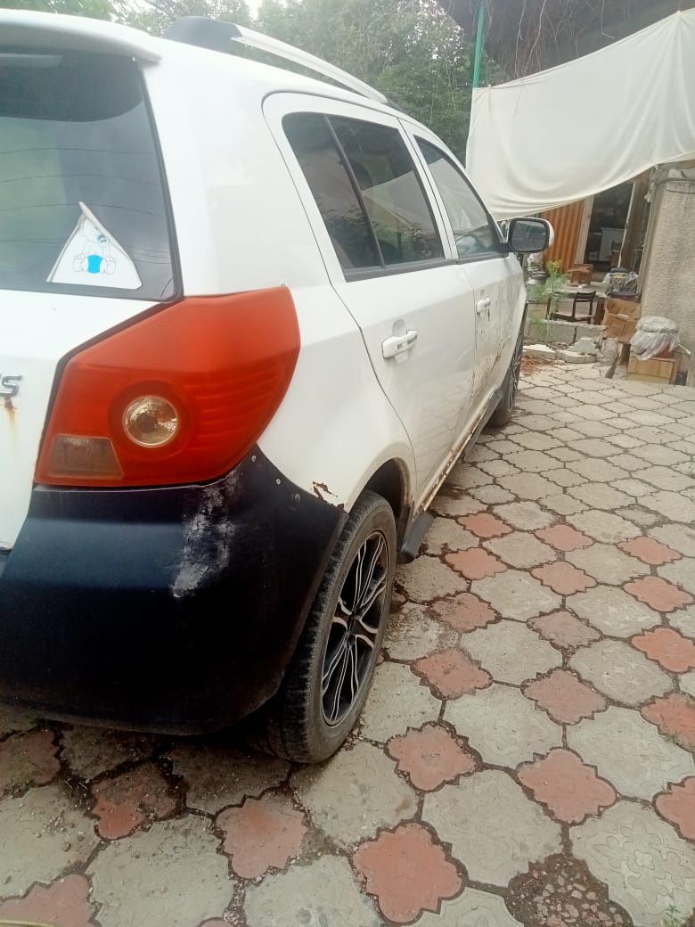Машина Geely MK Cross 2015