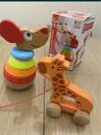 Развивающая игрушка. Пирамидка Щенок Hape и жираф