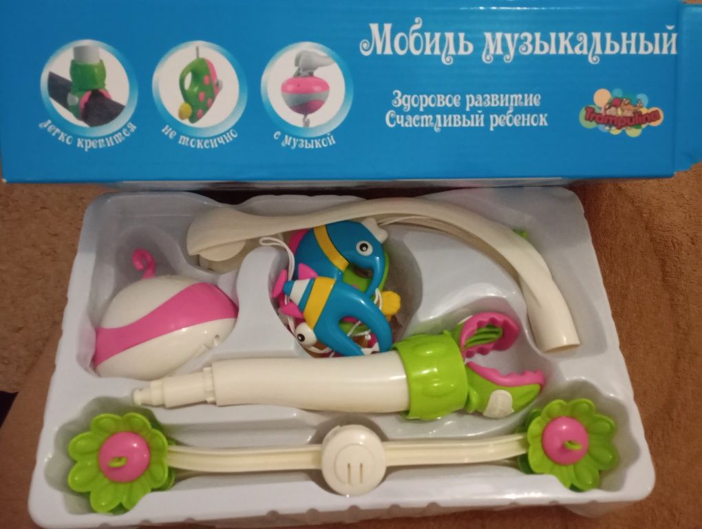 Продам музыкальную карусель в детский манеж